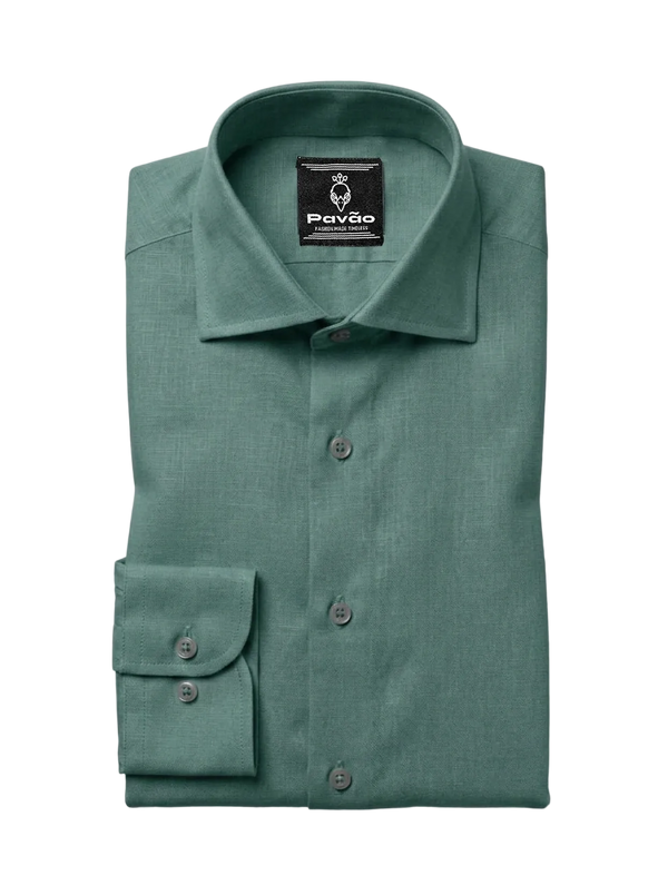 A folded sage green dress shirt with a spread collar and button-down front, featuring a brand label for 'Pavão' on the inside collar, set against a clean white background.