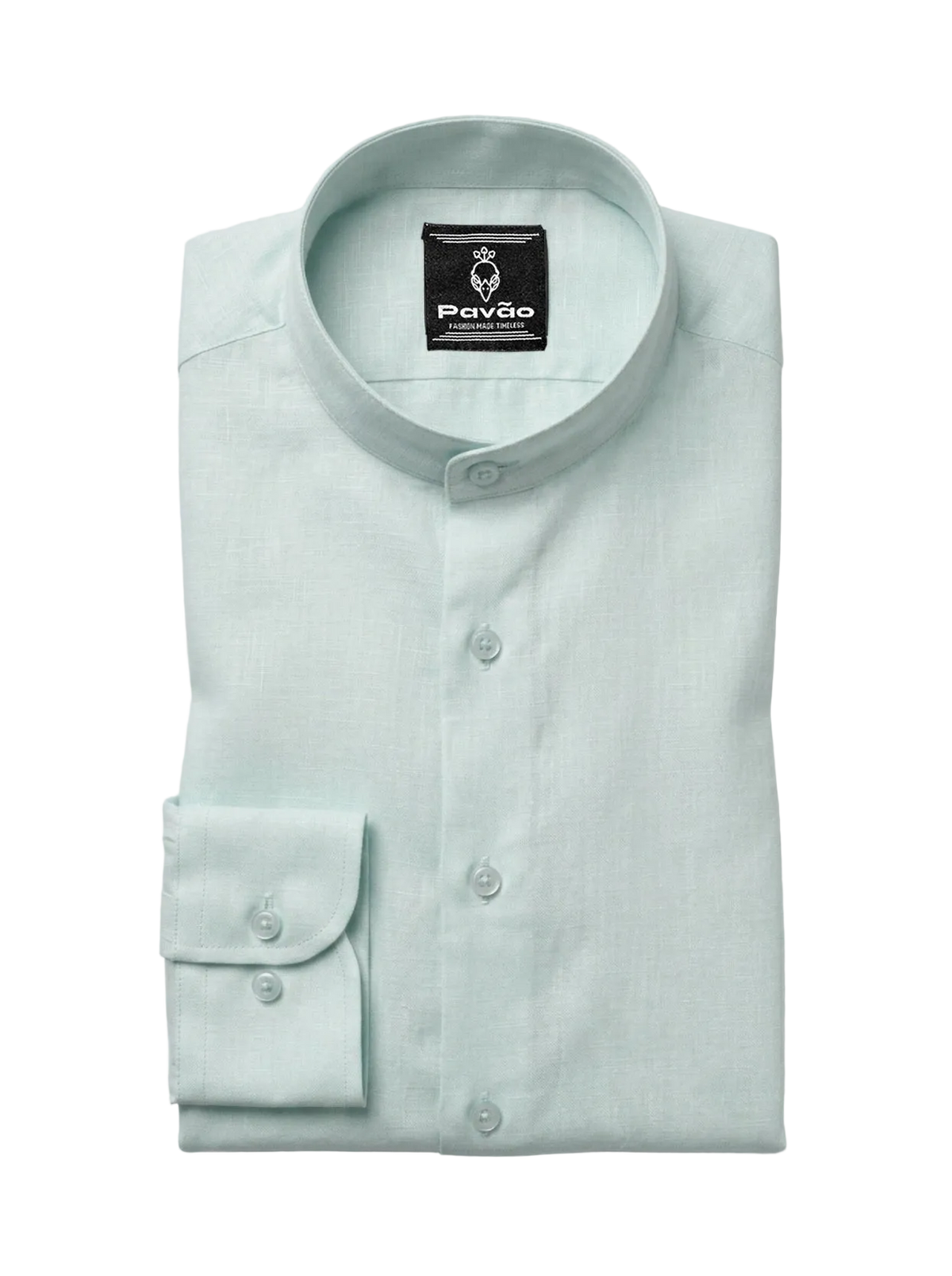 A folded light mint green dress shirt with a band collar and a single-button cuff, displayed on a neutral light gray background. The brand label 'Pavão' is visible inside the collar.