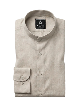 A folded light beige linen shirt with a mandarin collar and button-down front, featuring a brand label for 'Pavão' on the inside collar and a single buttoned cuff, shown on a light gray background.