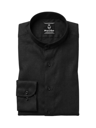 A folded black long-sleeve dress shirt with a mandarin collar and a single-button cuff, shown on a light gray background. The brand label 'Pavão' is visible inside the collar.