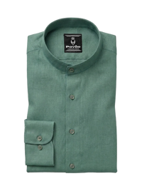 A folded sage green long-sleeve dress shirt with a mandarin collar and button-down front, featuring a visible Pavão brand label on the inner neck.