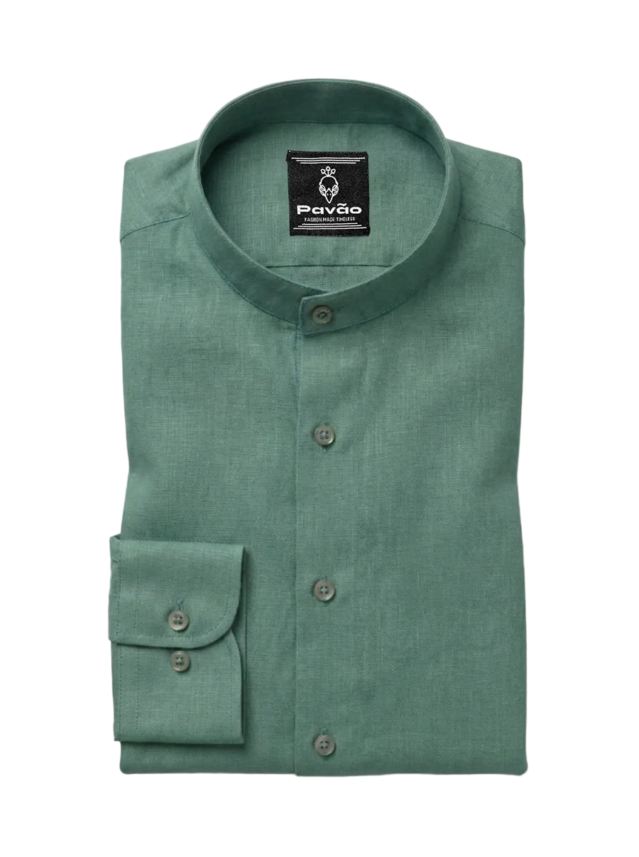 A folded sage green long-sleeve dress shirt with a mandarin collar and button-down front, featuring a visible Pavão brand label on the inner neck.