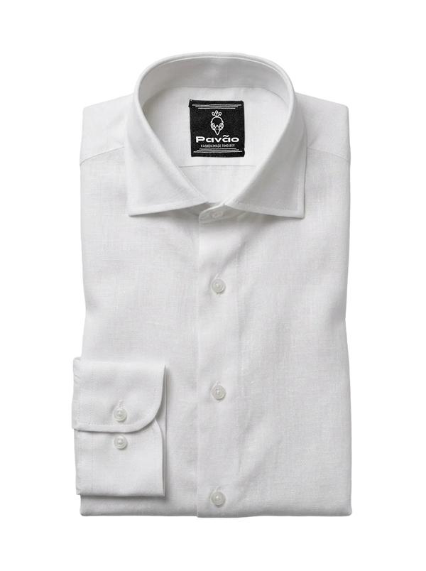 A folded white long-sleeve dress shirt with a spread collar and a single-button cuff, shown on a light gray background. The brand label 'Pavão' is visible inside the collar.