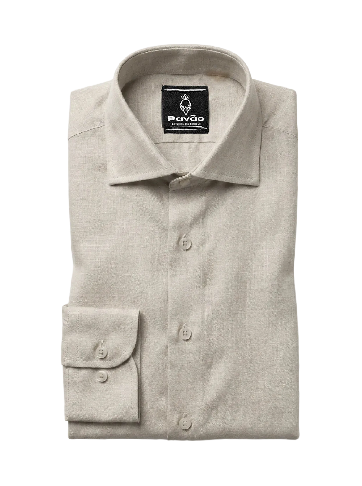 A folded light beige linen dress shirt with a button-down front and a single-button cuff, displayed on a clean white background. The brand label 'Pavão' is visible inside the collar.