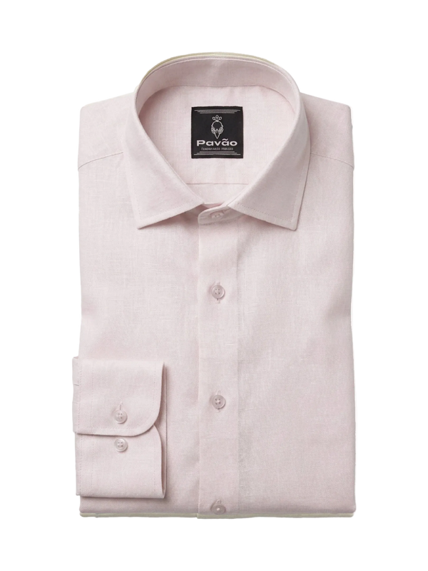A folded light pink dress shirt with a pointed collar, button-down front, and a single-button cuff, shown on a plain white background. The brand label inside the collar reads Pavão.